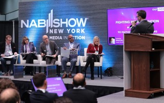 Richard Zack, Founder and CEO, Our.News, pitching to the judges (from the left: Joe Weir, Vice President Digital Media at Cox Media Group; Michele Laven, President of Strategic Partnerships Group at iHeartMedia; Roger Keating, Chief Strategy and Business Development Officer at Hearst Television; Mike Chapman, Managing Director at Accenture Strategy; Lora Dennis, Senior Vice President of Digital Media at NBC Owned Television Stations; )