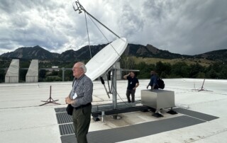 Two Was Satellite Time and Frequency Transfer (TWSTFT) dishes on the roof at NIST.